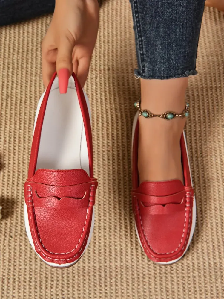 elveswallet Red and white stitching rubber sole loafers